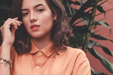 Woman wearing an orange shirt